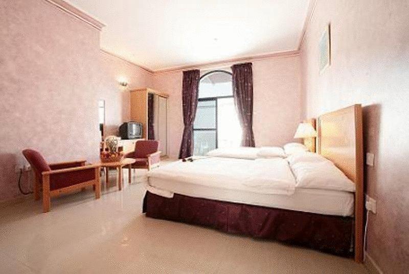 Beach Hotel Muskat Ruang foto