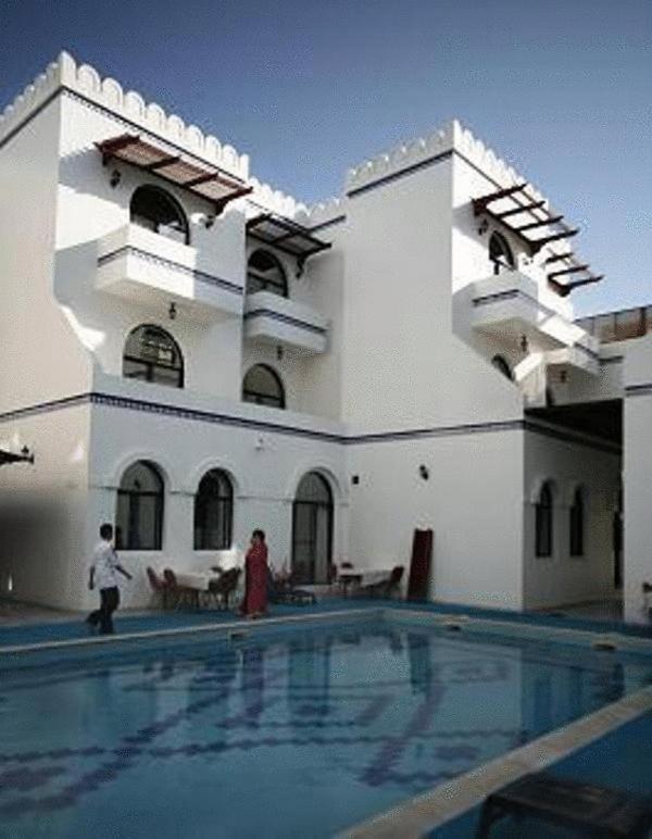 Beach Hotel Muskat Ruang foto